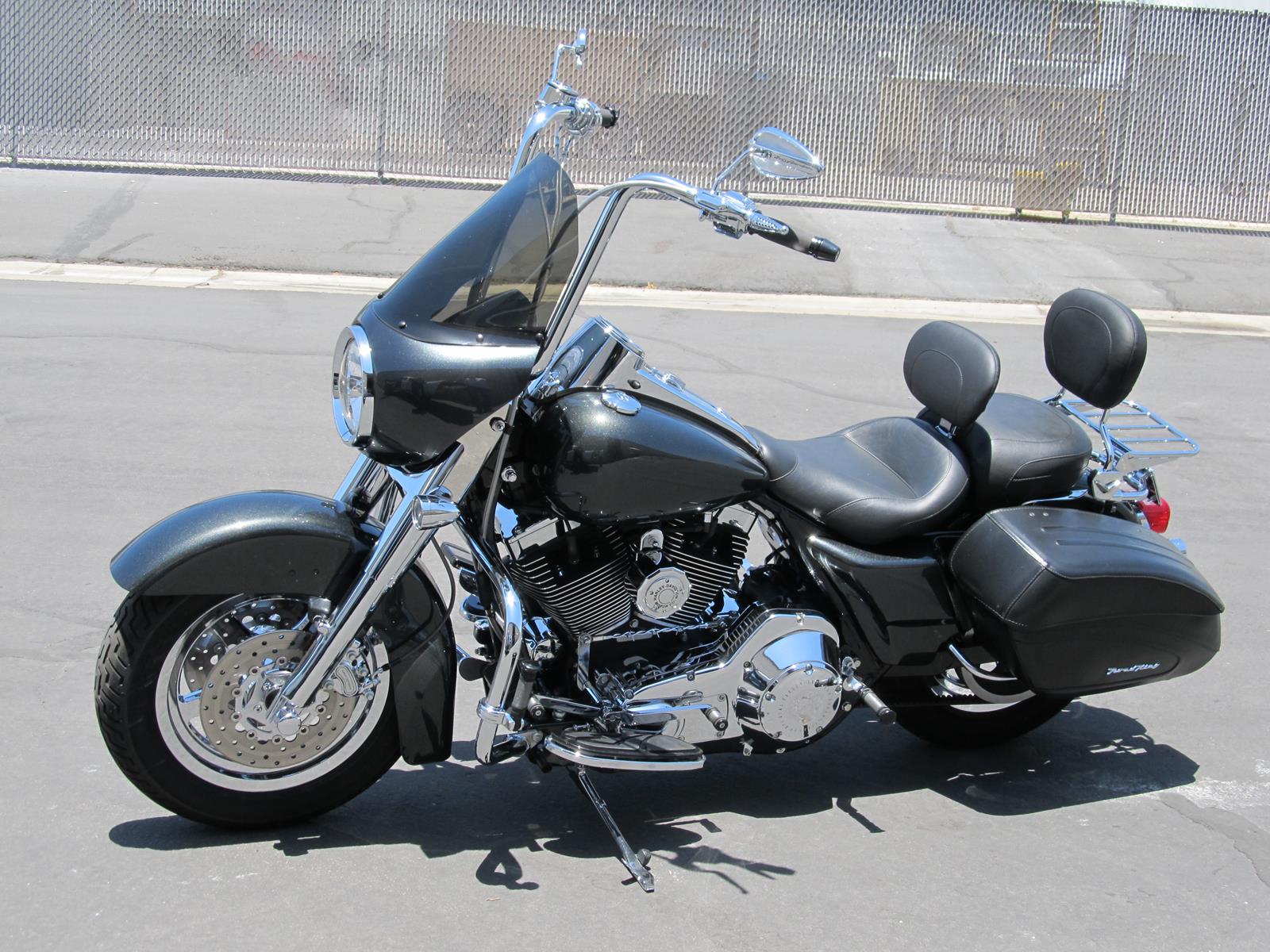 Road King No scallops 9 inch hole tall windshield.